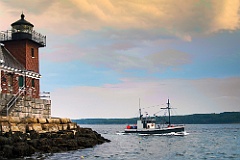 Fishing Trawler Passes Rockland Breakwater Light in Maine As